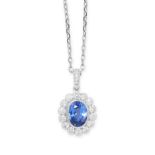 A SAPPHIRE AND DIAMOND PENDANT set with a central oval cut sapphire of 4.00 carats within a