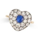 A DIAMOND AND SAPPHIRE RING designed as a heart, set with a cushion cut sapphire of 0.60 carats in a