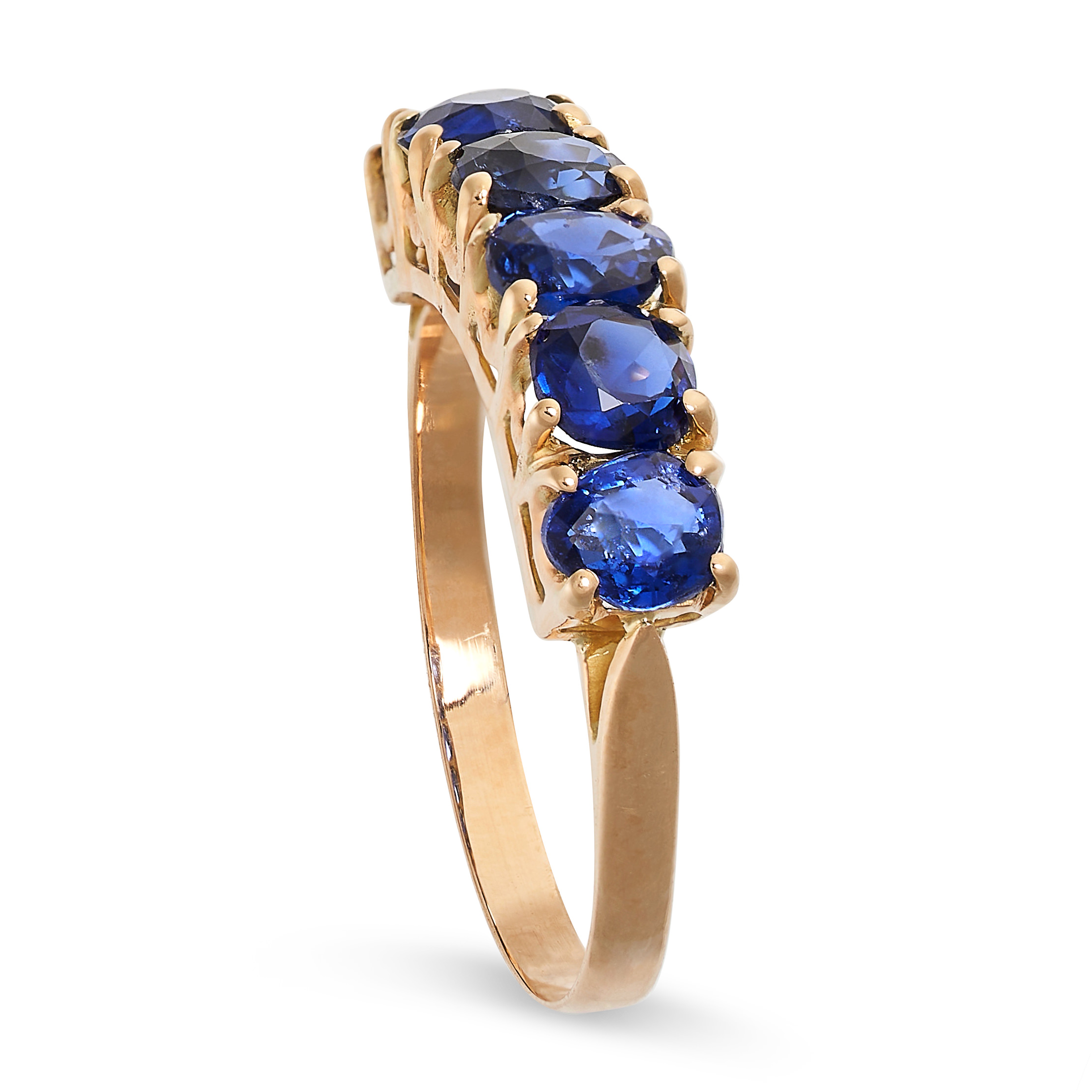 A CEYLON NO HEAT SAPPHIRE DRESS RING in yellow gold, set with a row of six cushion cut blue - Image 2 of 2