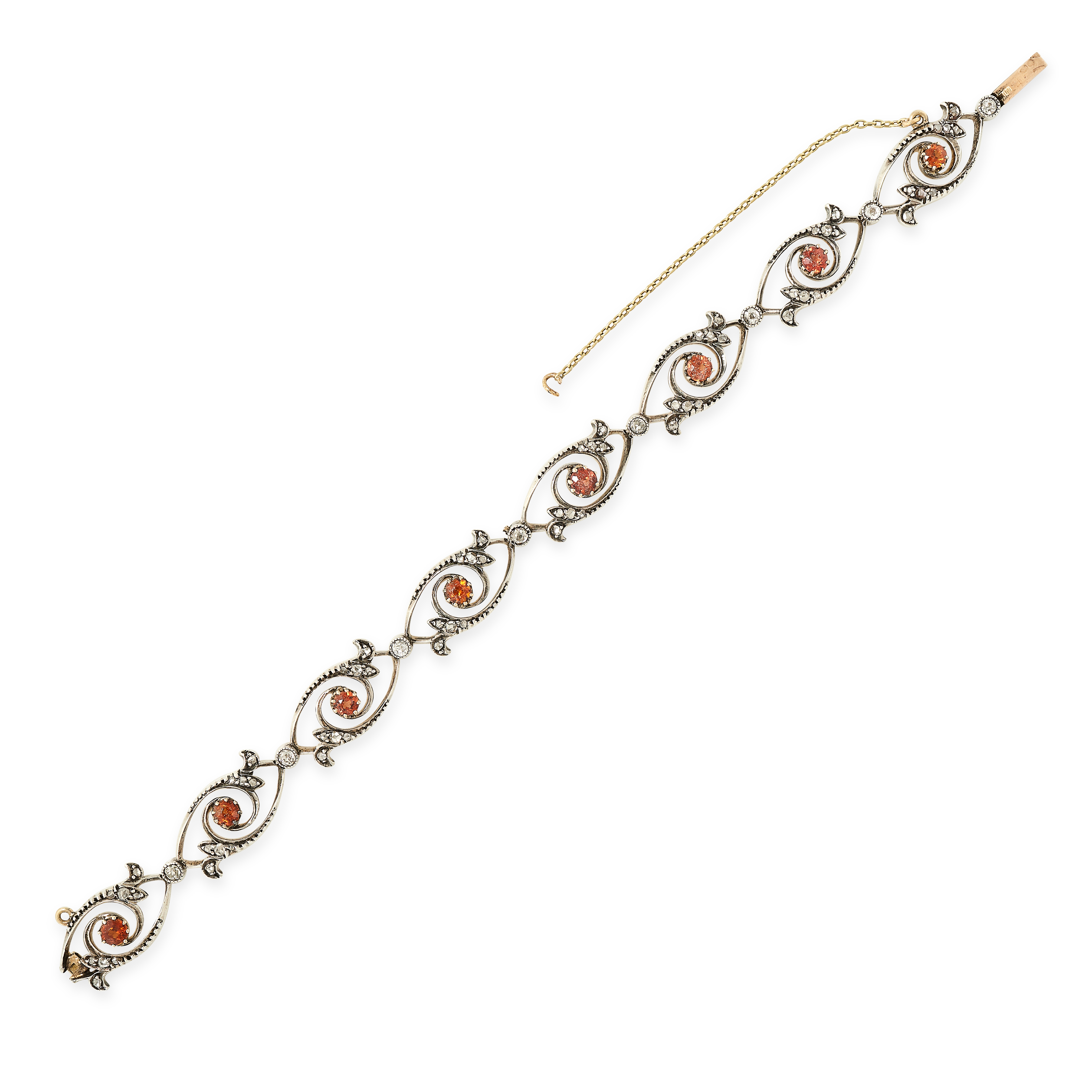 AN ANTIQUE DIAMOND AND BROWN ZIRCON BRACELET in 18ct yellow gold and silver, comprising eight