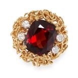 A VINTAGE ALMANDINE GARNET AND DIAMOND COCKTAIL RING in 18ct gold, set centrally with a cushion