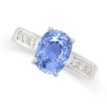 A CEYLON NO HEAT SAPPHIRE AND DIAMOND RING set with an oval cut sapphire of 4.90 carats accented