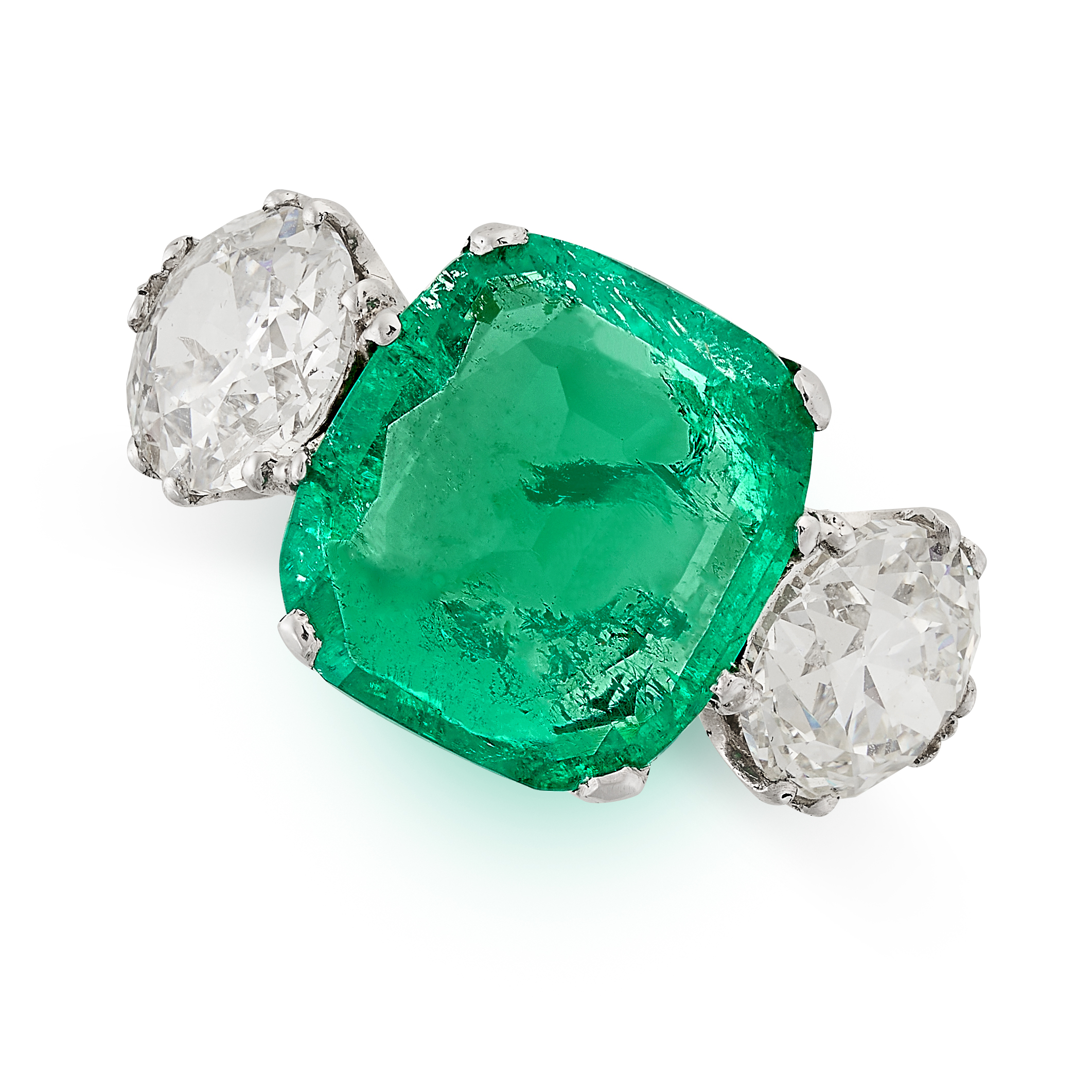 A FINE COLOMBIAN EMERALD AND DIAMOND DRESS RING in platinum, set with a cushion cut emerald of 4.