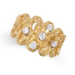 A DIAMOND DRESS RING in yellow gold, in abstract design, set with five round brilliant cut