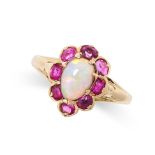 AN ANTIQUE OPAL AND RUBY RING in yellow gold, set with a pear shaped cabochon opal within a border
