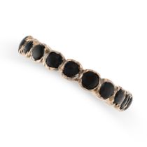 AN ANTIQUE JET RING the band comprising circular pieces of jet, no assay marks, size J / 4, 1.0g.