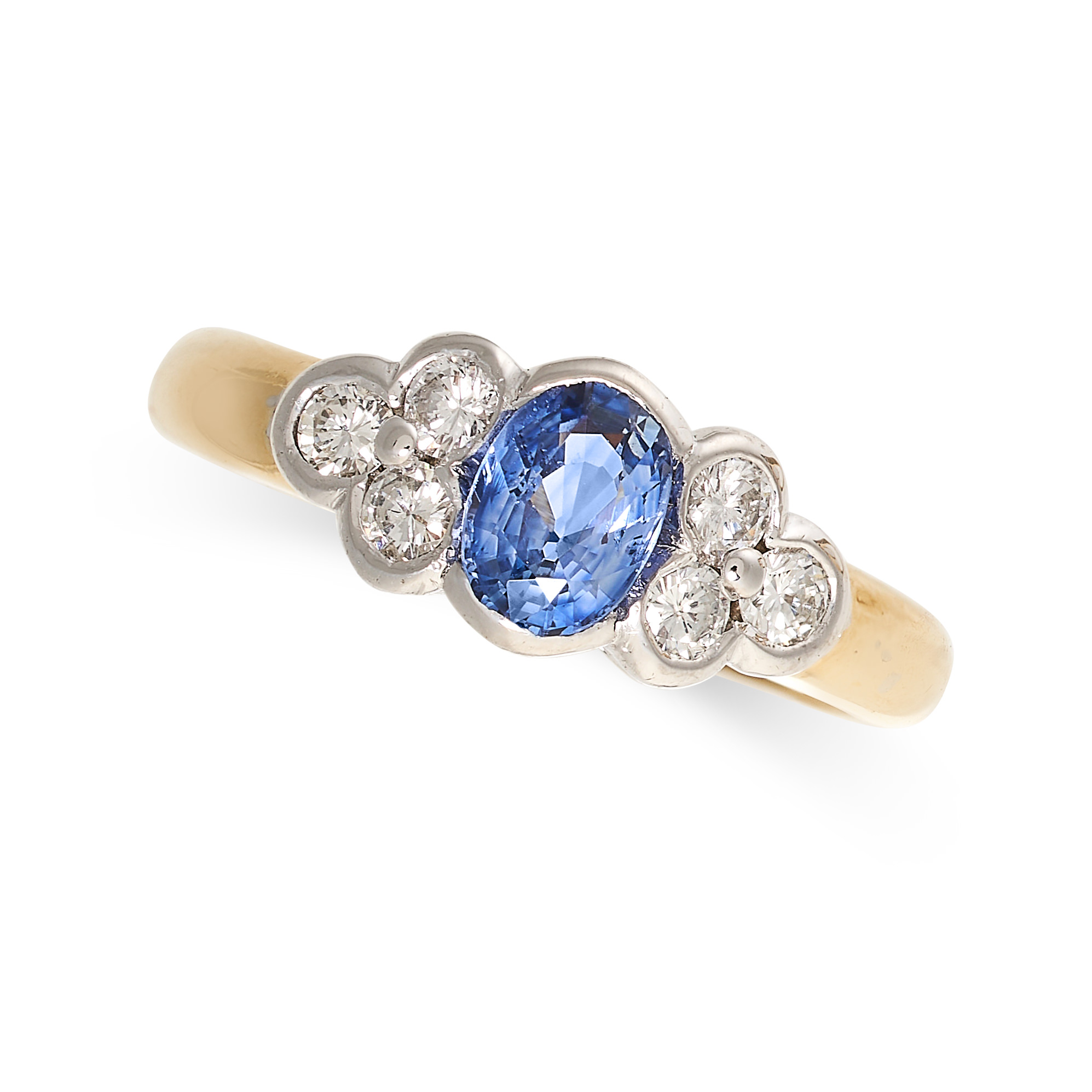 A SAPPHIRE AND DIAMOND DRESS RING in 18ct yellow gold and white gold, set with an oval cut blue