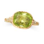 A PERIDOT DRESS RING in yellow gold, set with a cushion cut peridot, no assay marks, size L / 5.5,