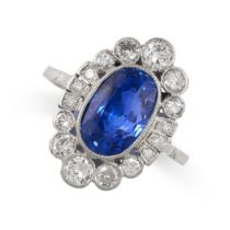 A BURMA NO HEAT SAPPHIRE AND DIAMOND RING set with a cushion cut blue sapphire of 4.18 carats,