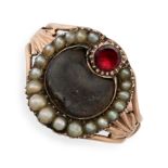 AN ANTIQUE GARNET AND PEARL MOURNING LOCKET RING, 19TH CENTURY in yellow gold, the face with a