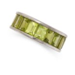 NO RESERVE - A PERIDOT ETERNITY BAND RING in platinum, the band set all around with a single row