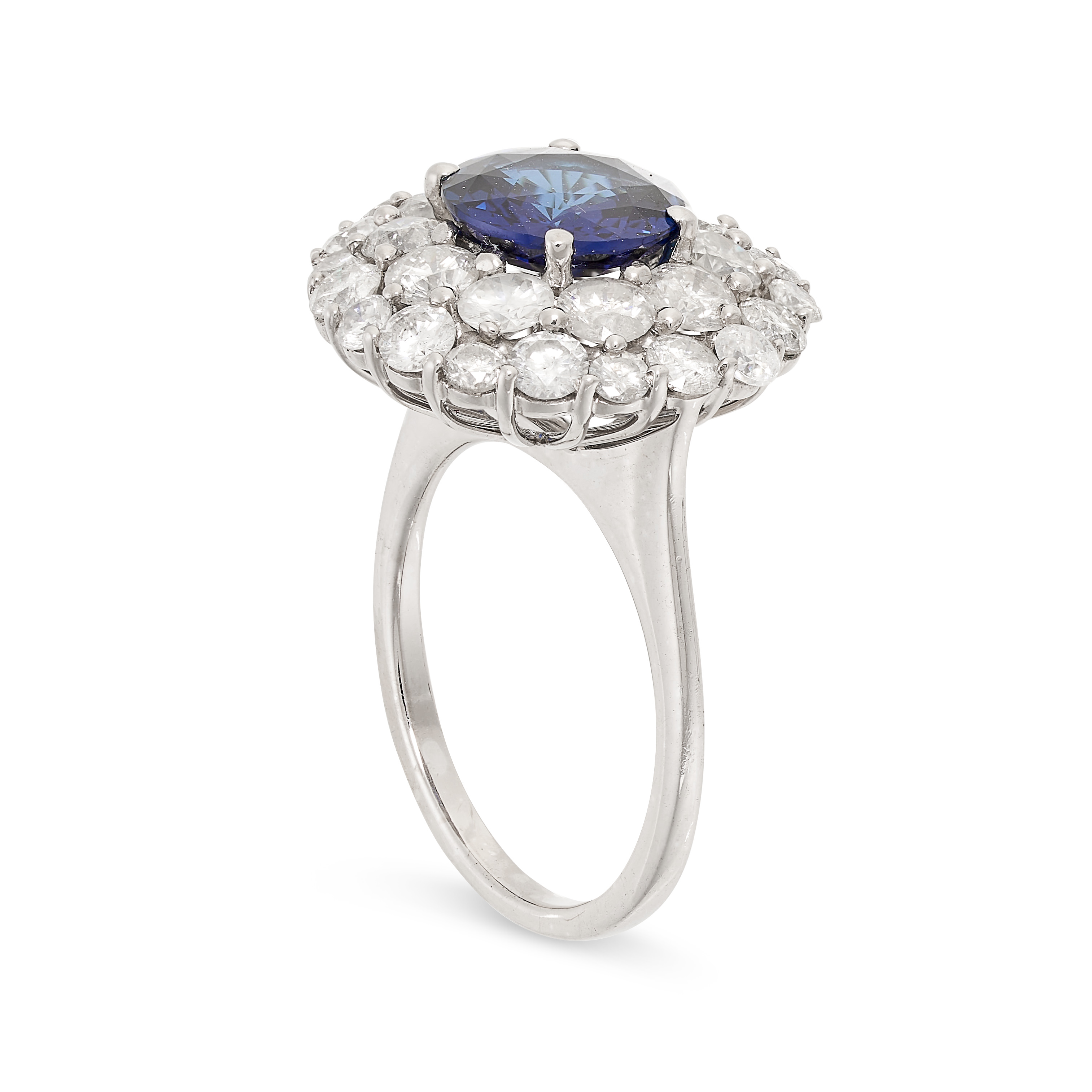 A SAPPHIRE AND DIAMOND CLUSTER RING in 18ct white gold, set with a round cut sapphire of 2.52 carats - Image 2 of 2