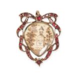 AN ANTIQUE GARNET AND HAIRWORK MOURNING LOCKET PENDANT designed as a ribbon tied as a bow set with