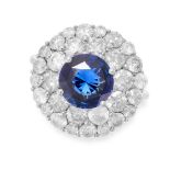A SAPPHIRE AND DIAMOND CLUSTER RING in 18ct white gold, set with a round cut sapphire of 2.52 carats