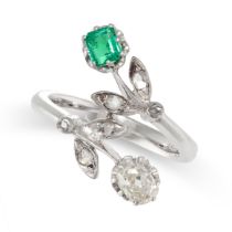 AN EMERALD AND DIAMOND RING in 18ct white gold, in foliate design, set with a step cut emerald of