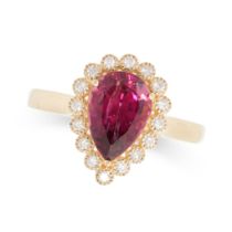 A GARNET AND DIAMOND RING in 18ct gold, set with a pear shaped garnet of 2.30 carats in a cluster of