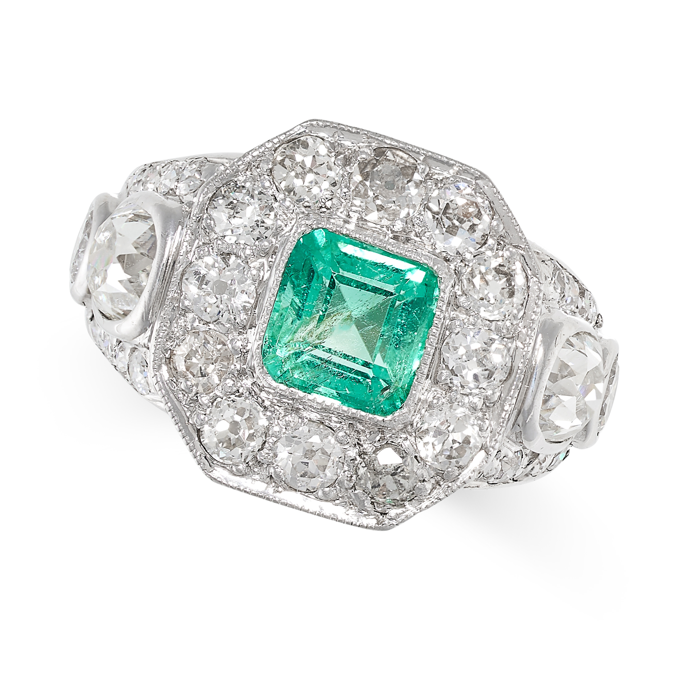 A COLOMBIAN EMERALD AND DIAMOND RING set with a step cut emerald of 1.14 carats in a border of old