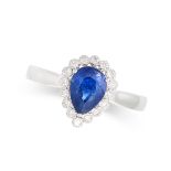 A SAPPHIRE AND DIAMOND CLUSTER RING in 18ct white gold, set with a pear shaped sapphire of 1.20