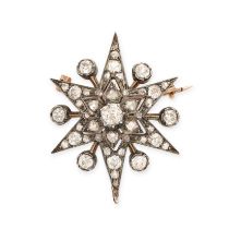 AN ANTIQUE DIAMOND STAR BROOCH / PENDANT in yellow gold and silver, set with old and rose cut
