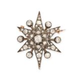AN ANTIQUE DIAMOND STAR BROOCH / PENDANT in yellow gold and silver, set with old and rose cut