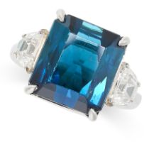 AN INDICOLITE TOURMALINE AND DIAMOND RING set with an octagonal step cut indicolite (dark blue