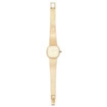 LONGINES, A VINTAGE LADIES YELLOW GOLD WRISTWATCH, in 14ct yellow gold, a curved dial with champagne