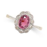 A SPINEL AND DIAMOND CLUSTER RING set with an oval cut spinel of 1.01 carats within a cluster of