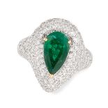 AN EMERALD AND DIAMOND RING in 18ct white gold, set with a central pear cut emerald of 2.54