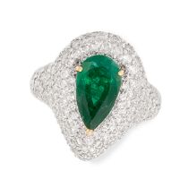 AN EMERALD AND DIAMOND RING in 18ct white gold, set with a central pear cut emerald of 2.54