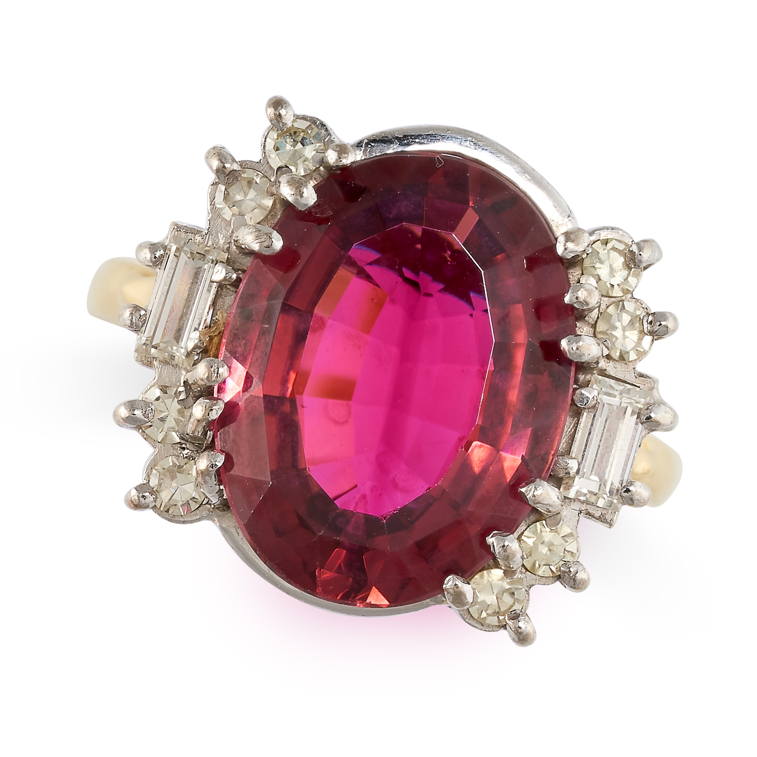 A PINK TOURMALINE AND DIAMOND RING in 18ct yellow gold, set with an oval cut pink tourmaline,