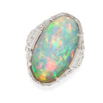 AN OPAL AND DIAMOND DRESS RING in 18ct yellow and white gold, set with an oval cabochon opal