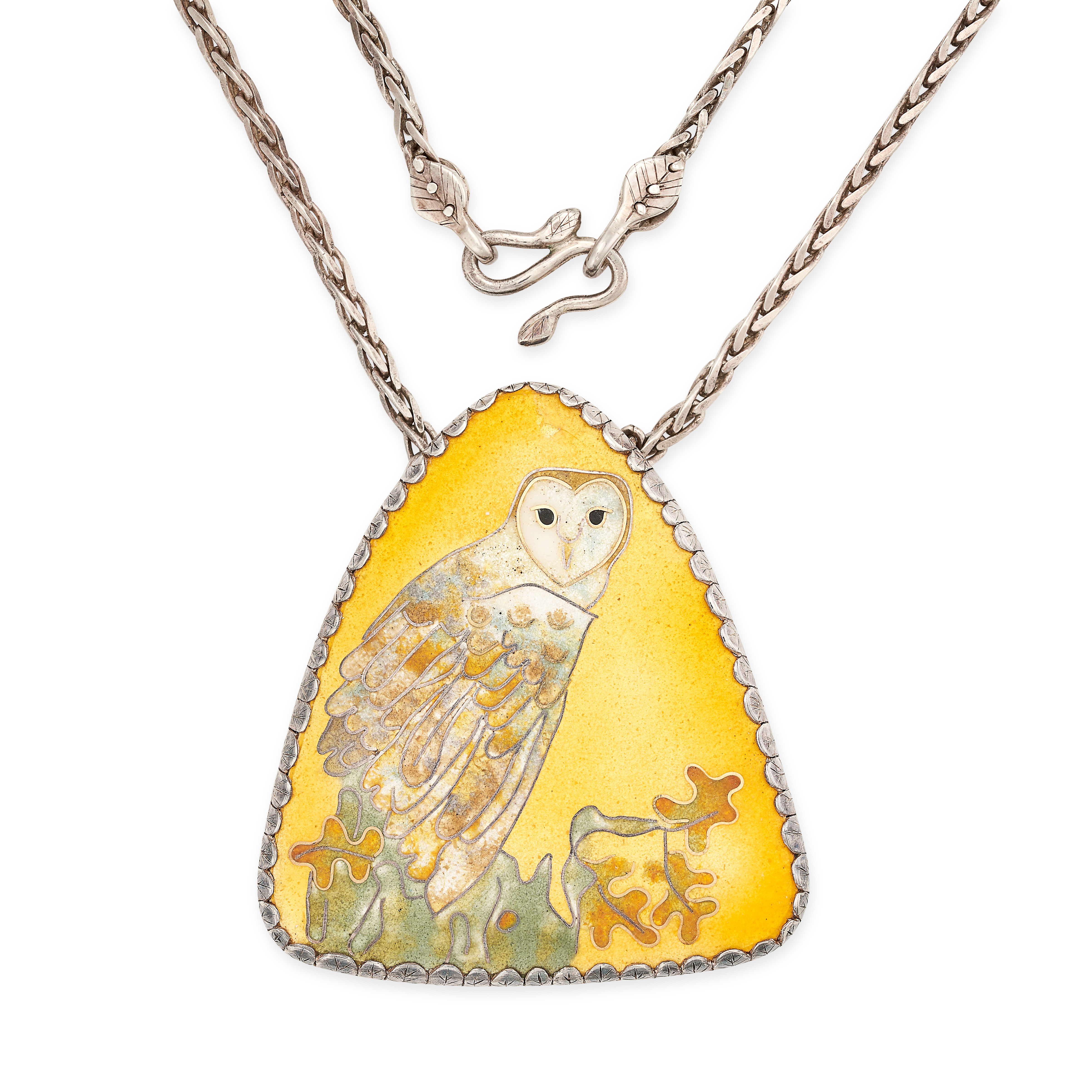 AN ENAMEL OWL PENDANT NECKLACE in silver, designed as a barn owl sitting among foliage in enamel,