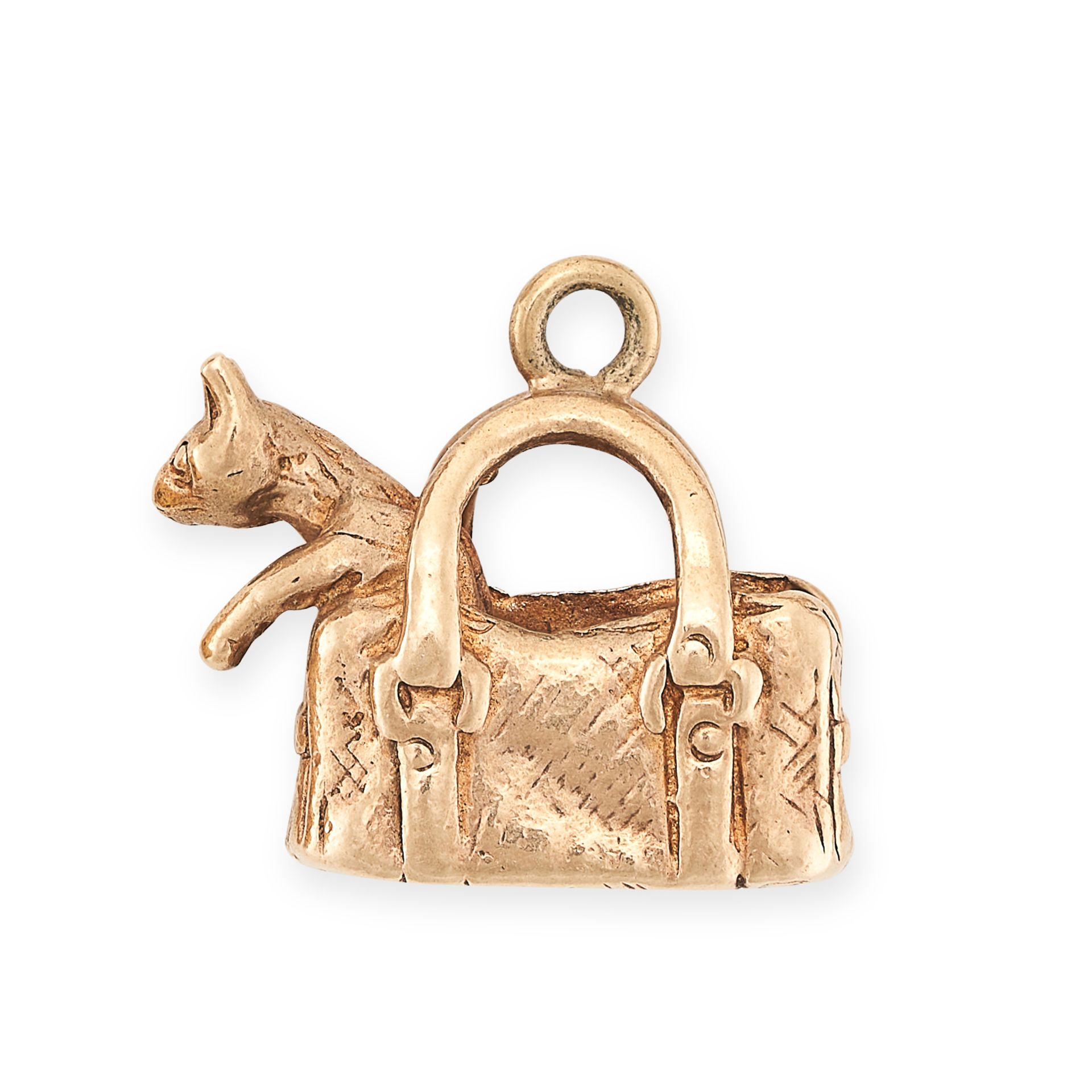 A VINTAGE CAT AND HANDBAG CHARM / PENDANT in 9ct yellow gold, designed as a cat poking out of a