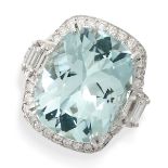 AN AQUAMARINE AND DIAMOND RING set with a cushion cut aquamarine of 14.29 carats in a border of