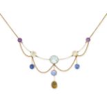 AN ANTIQUE AQUAMARINE, SAPPHIRE, AMETHYST AND ZIRCON NECKLACE in yellow gold, set with a central