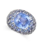 A SAPPHIRE BOMBE RING in 18ct white gold, the domed face set with a central cushion cut sapphire