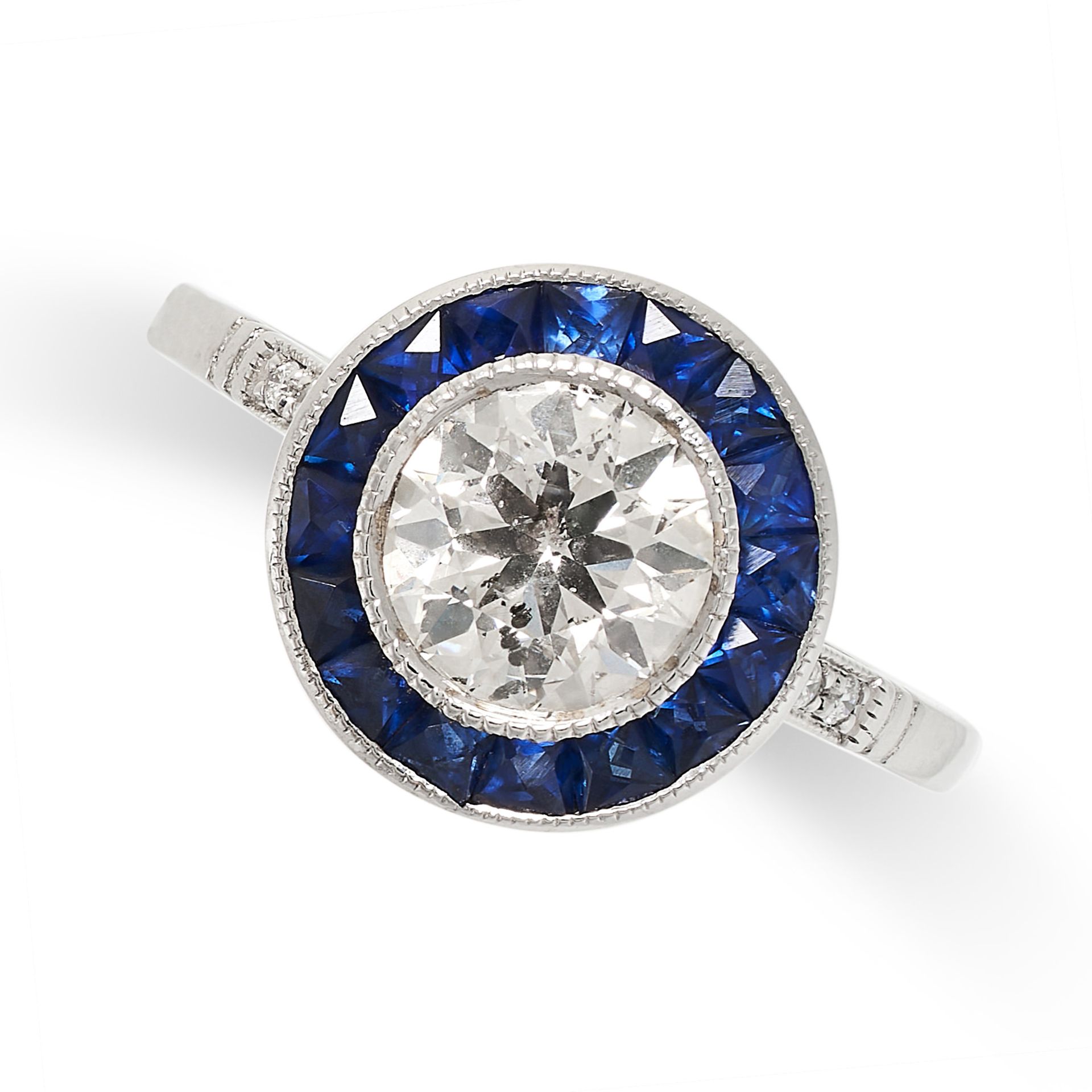A DIAMOND AND SAPPHIRE TARGET RING set with a round cut diamond of 1.01 carats within a border of