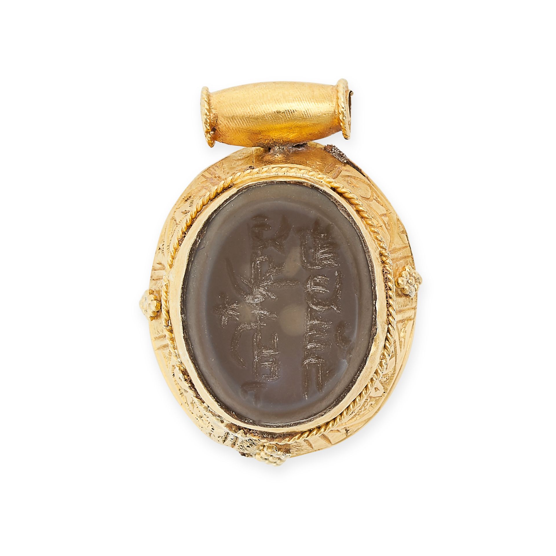 A HARDSTONE SEAL PENDANT set with an oval hardstone intalgio with engraved Arabic script, within a