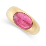 A PINK TOURMALINE RING set with an oval cabochon pink tourmaline on a gold band, signed Cartier,