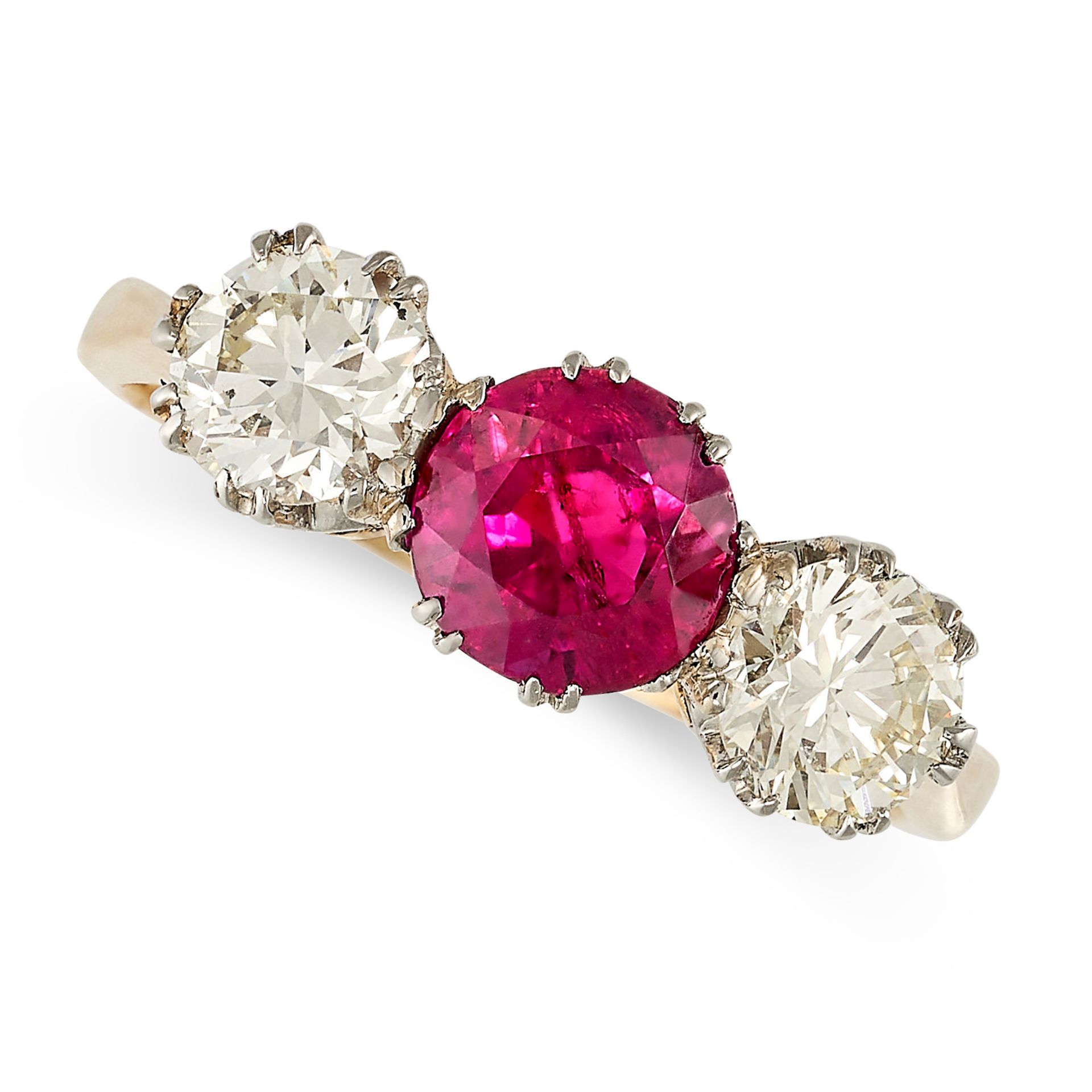 A RUBY AND DIAMOND THREE STONE RING set with a round cut ruby of 1.35 carats accented by two round