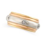 CARTIER, A DIAMOND SPINNING ETERNITY RING in 18ct white and yellow gold, the central spinning