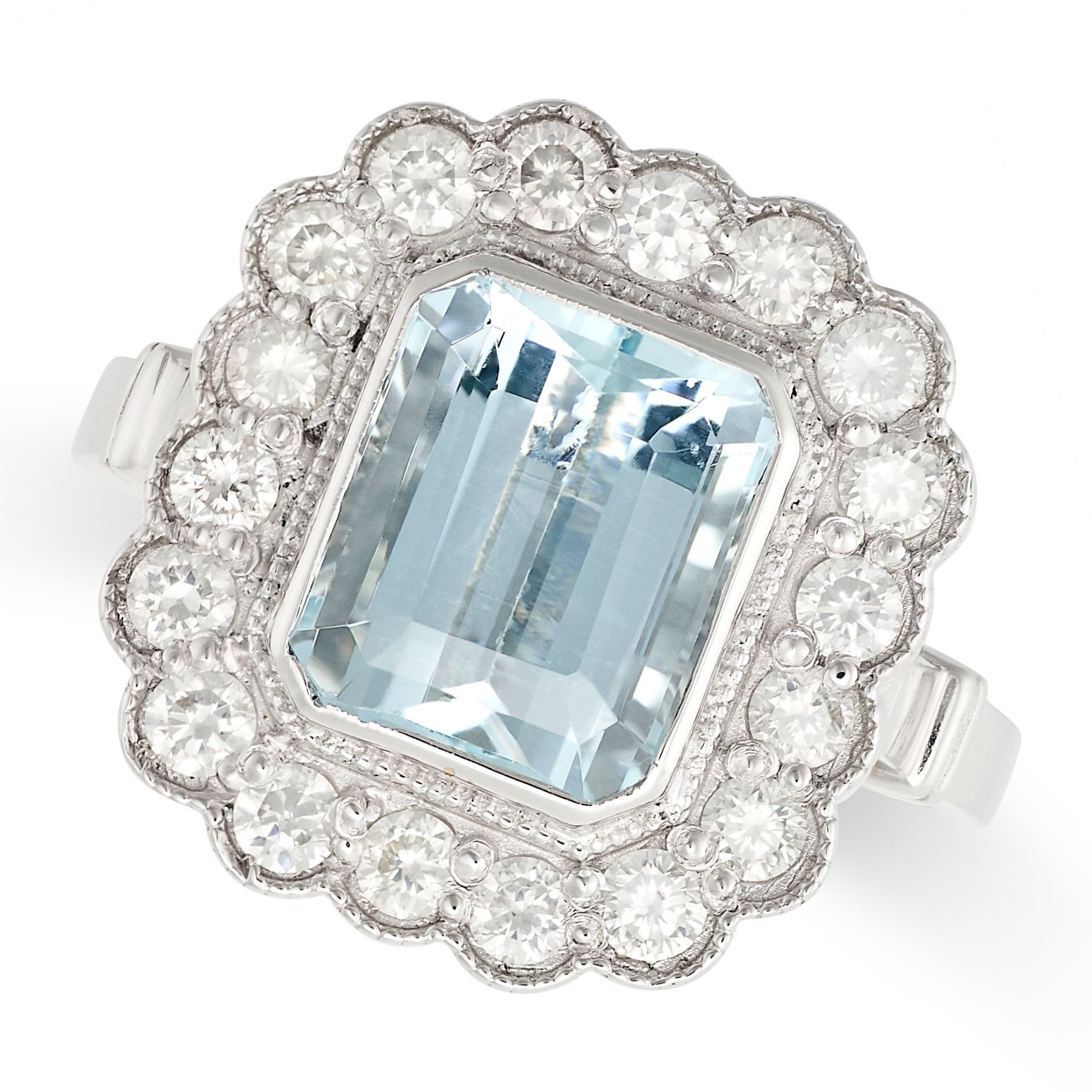 AN AQUAMARINE AND DIAMOND CLUSTER RING set with an emerald cut aquamarine of 3.30 carats in a