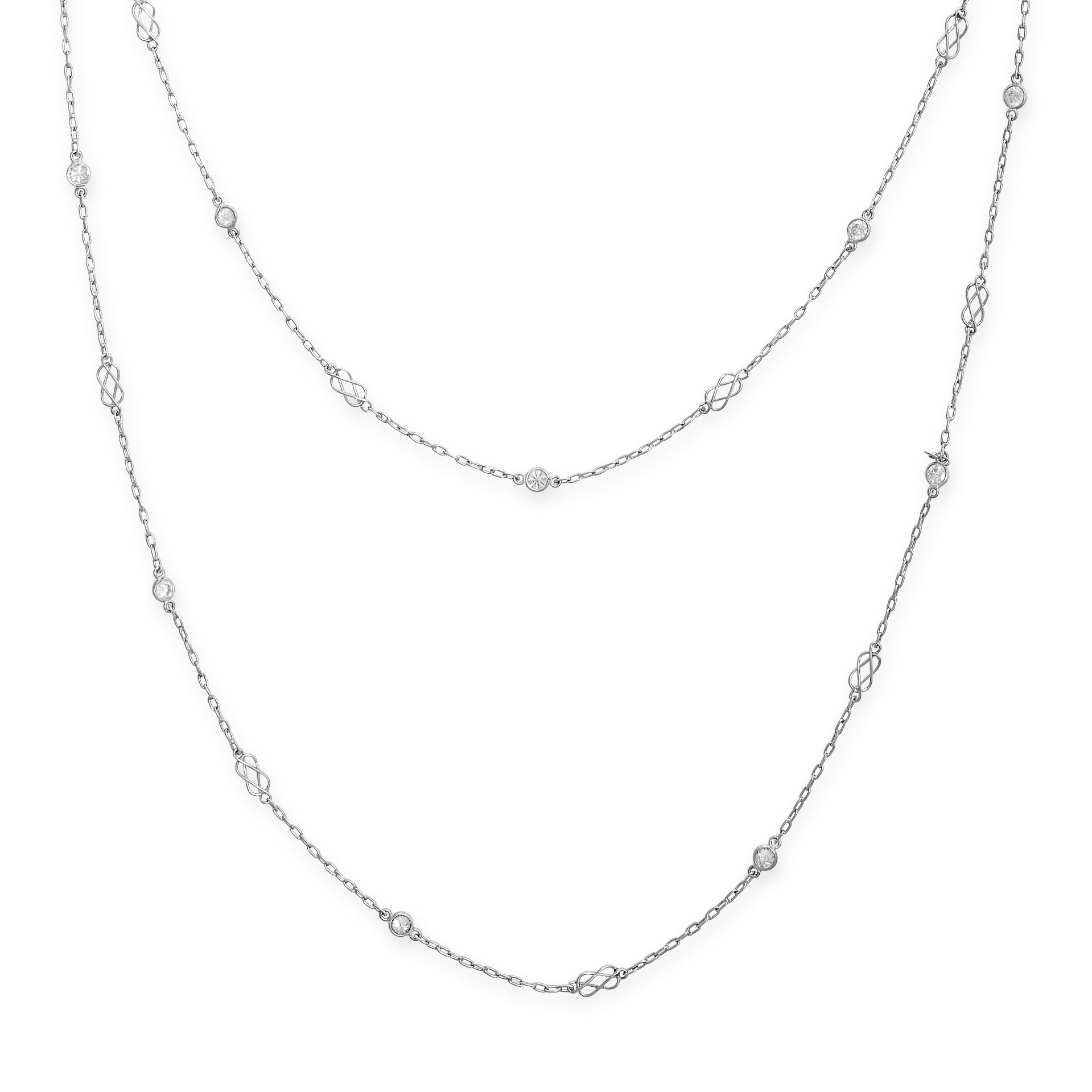 AN ART DECO DIAMOND CHAIN SAUTOIR / NECKLACE in platinum, the long chain with alternating round
