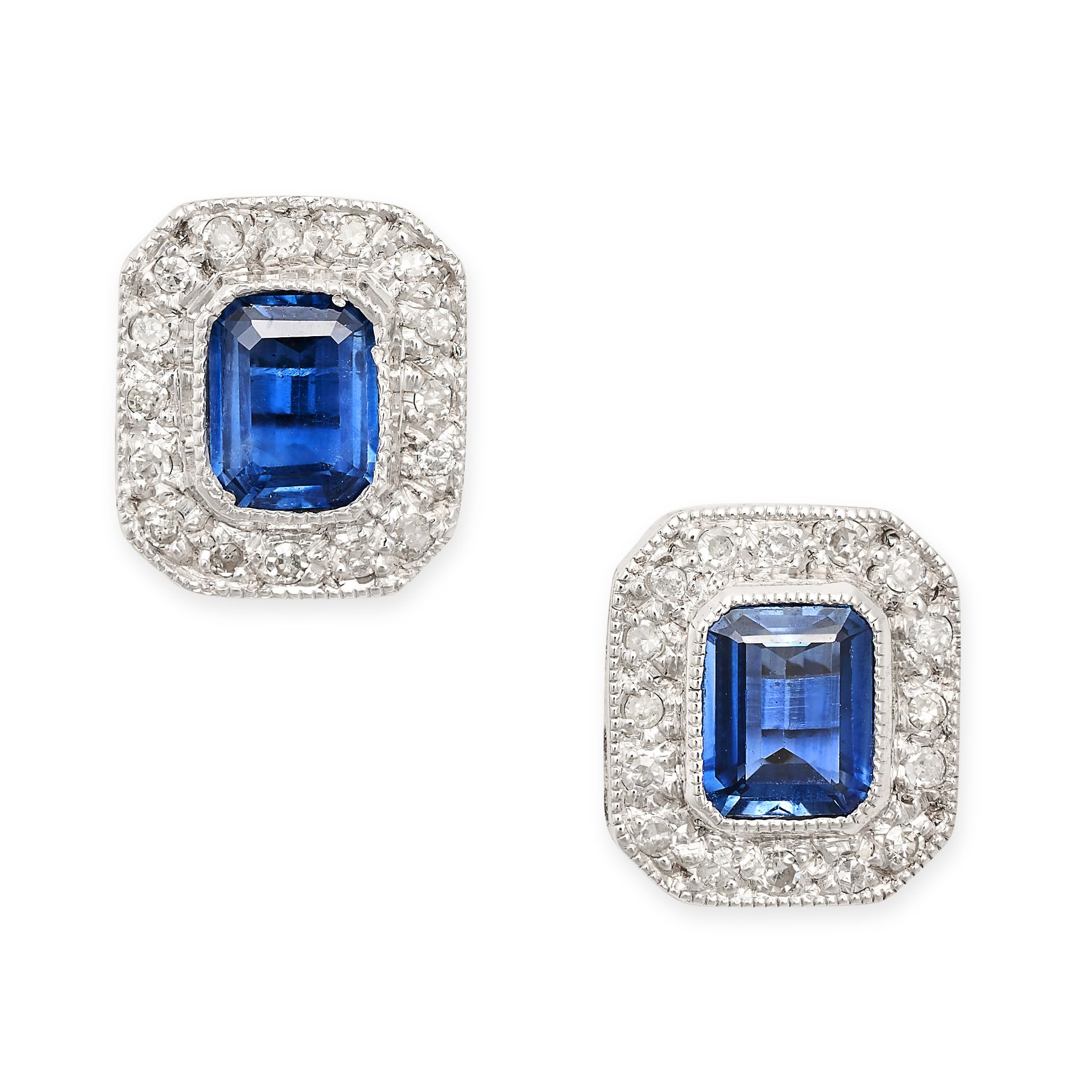 A PAIR OF SAPPHIRE AND DIAMOND STUD EARRINGS in white gold, each set with an octagonal cut blue