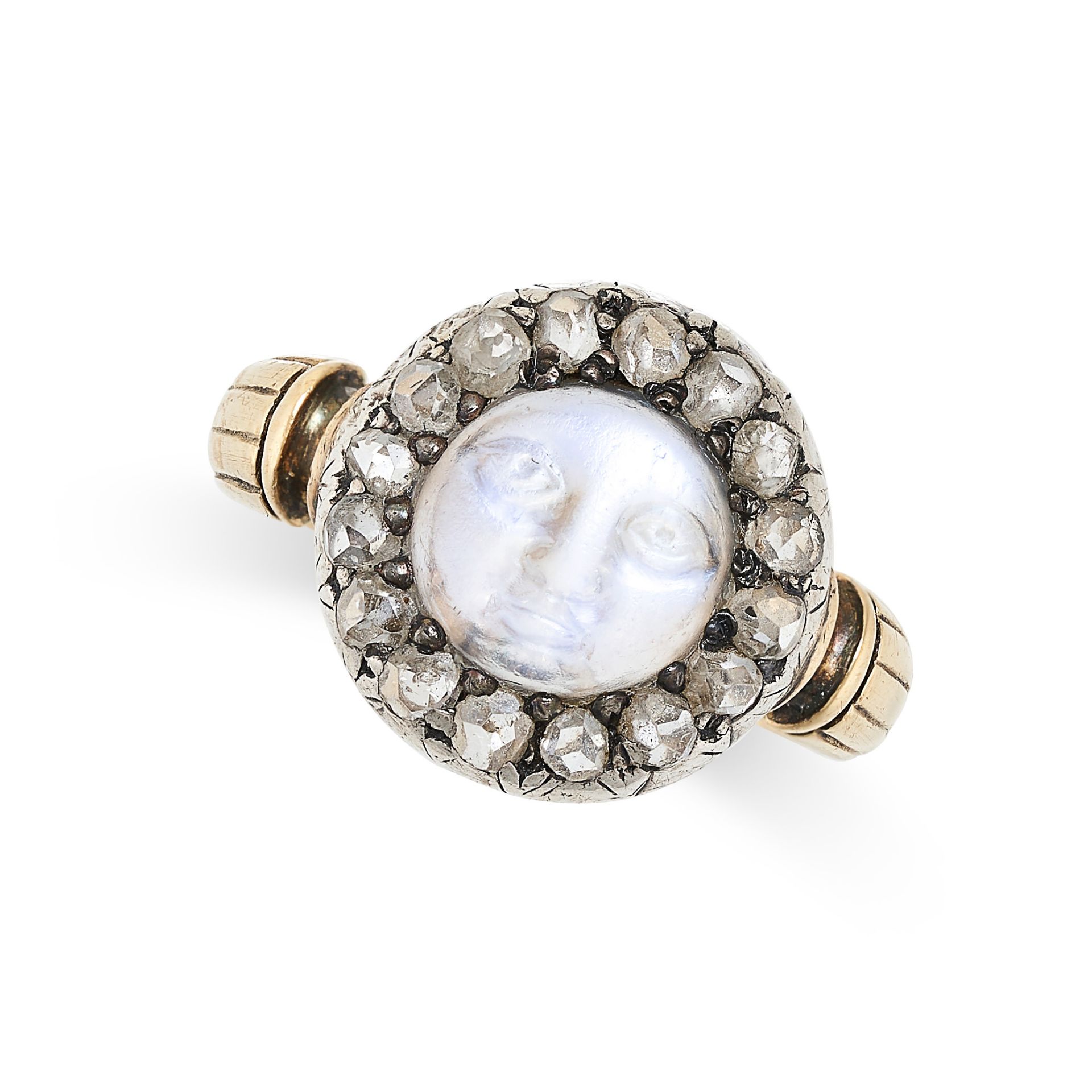 AN ANTIQUE MOONSTONE MAN IN THE MOON AND DIAMOND RING in yellow gold and silver, set with a carved