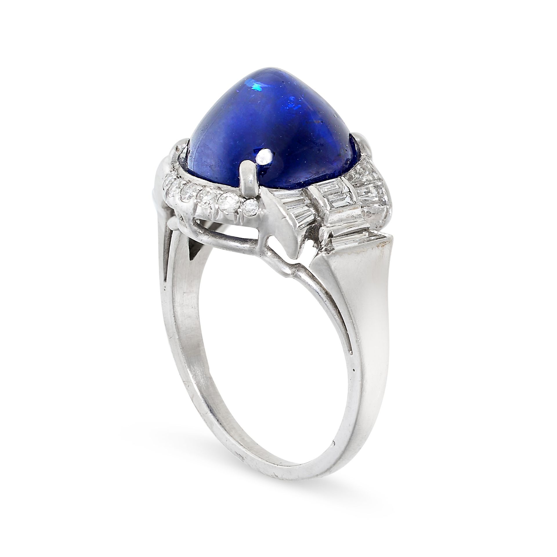 A SAPPHIRE AND DIAMOND RING set with a sugarloaf cabochon sapphire of 6.30 carats, accented by round - Bild 2 aus 2