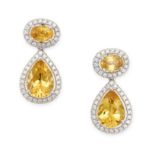 A PAIR OF CITRINE AND DIAMOND DROP EARRINGS each set with an oval cut citrine within a border of