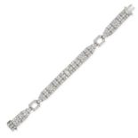 RAYMOND YARD, AN ART DECO DIAMOND BRACELET in platinum, the geometric links set with marquise and