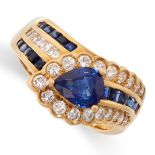 A SAPPHIRE AND DIAMOND DRESS RING in 18ct yellow gold, set with a central pear cut sapphire accented