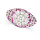 A RUBY AND DIAMOND RING set with a central cluster of old cut diamonds, accented by scallop motifs